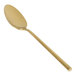 A long gold Front of the House Hector stainless steel teaspoon.