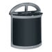 A black and grey Rubbermaid half round dual stream trash can with a lid on top.