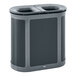 A black and grey Rubbermaid dual stream trash can.