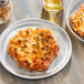 Two plates of Tony's Fiestada pizza on a table.