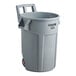 A Rubbermaid grey plastic bin with wheels and a handle.