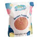 A white bag of Yum Crumbs Salted Caramel Crumb Topping with a pink circle label.