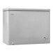 A white Danby chest freezer with a button on the side.