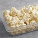 A plastic container filled with Fresh Cauliflower Florets.