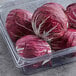 Fresh radicchio in a plastic container.