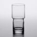 A Libbey Newton stackable beverage glass on a table.