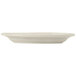 A Libbey Porcelana cream white porcelain platter with wide rim and rolled edge.