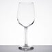 A clear Libbey Vina wine glass on a white table.