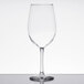 A clear Libbey Vina wine glass on a white table.