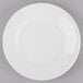 A Libbey Porcelana bright white porcelain plate with a wide rim.