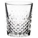 A Libbey Carats rocks glass with a diamond cut design.