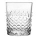 A clear 12 oz. rocks glass with a textured, diamond-patterned lower half.