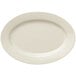 A Libbey Porcelana white oval platter with a wide rim.