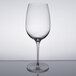 A clear Reserve by Libbey Renaissance wine glass on a reflective surface.