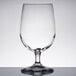 A close-up of a clear Libbey Vina wine goblet on a table.