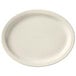 A Libbey Porcelana white oval platter with a narrow rim.