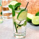 A Libbey Collins glass with water, lime, and mint.