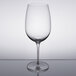 A Reserve by Libbey Renaissance wine glass on a reflective surface.