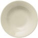 A close up of a Libbey Porcelana Cream white porcelain deep soup bowl with a wide rim.