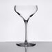 A clear glass Libbey Prism coupe glass on a white surface.