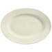 A Libbey Porcelana white porcelain platter with a wide white rim.