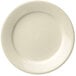 A Libbey Porcelana cream white plate with a wide rim and plain edge.