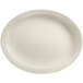 A Libbey Porcelana cream white oval platter with a plain edge on a white background.