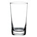 A close-up of a Libbey clear highball glass with a white background.