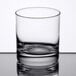 A close up of a clear Libbey Rocks glass.