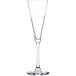 A clear Libbey trumpet flute glass with a long stem.