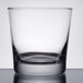 A Libbey rocks glass with a white background.