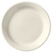 A Libbey Porcelana narrow rim cream white porcelain plate.