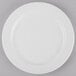 A Libbey Porcelana white porcelain plate with a wide white rim.