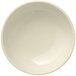 A Libbey Porcelana cream white porcelain pasta bowl with a rolled edge on a white background.