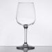 A clear Libbey Vina wine glass on a white table.