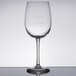 A Libbey Vina wine glass with etched pour lines. A clear wine glass with straight lines etched on it.