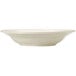 A close up of a Libbey Porcelana cream white pasta bowl with a wide rim and rolled edge.