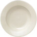 A Libbey Porcelana Cream white pasta bowl with a wide rim.