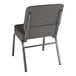 A Lancaster Table & Seating silver vein church chair with gray fabric and metal legs.