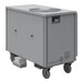 An Airrex 5 ton portable air-cooled heat pump, a large grey box with wheels.