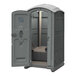 A gray J & J Echo One portable restroom with the door open.