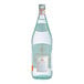 A case of 12 Acqua Panna Natural Spring Water clear glass bottles with white labels and orange text.