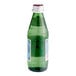 A San Pellegrino sparkling natural mineral water bottle with a green label.