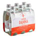 A close up of a case of 24 Acqua Panna natural spring water glass bottles.