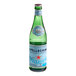 A close up of a San Pellegrino sparkling water bottle with a blue and green label.