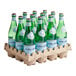 A carton of San Pellegrino Sparkling Natural Mineral Water glass bottles.