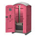 A pink J & J Echo One portable restroom with a door open.