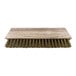 A Wood Stone brush head with gold bristles.