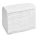 A large stack of white Just1 interfold dispenser napkins.