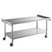 A Regency stainless steel equipment stand with casters.